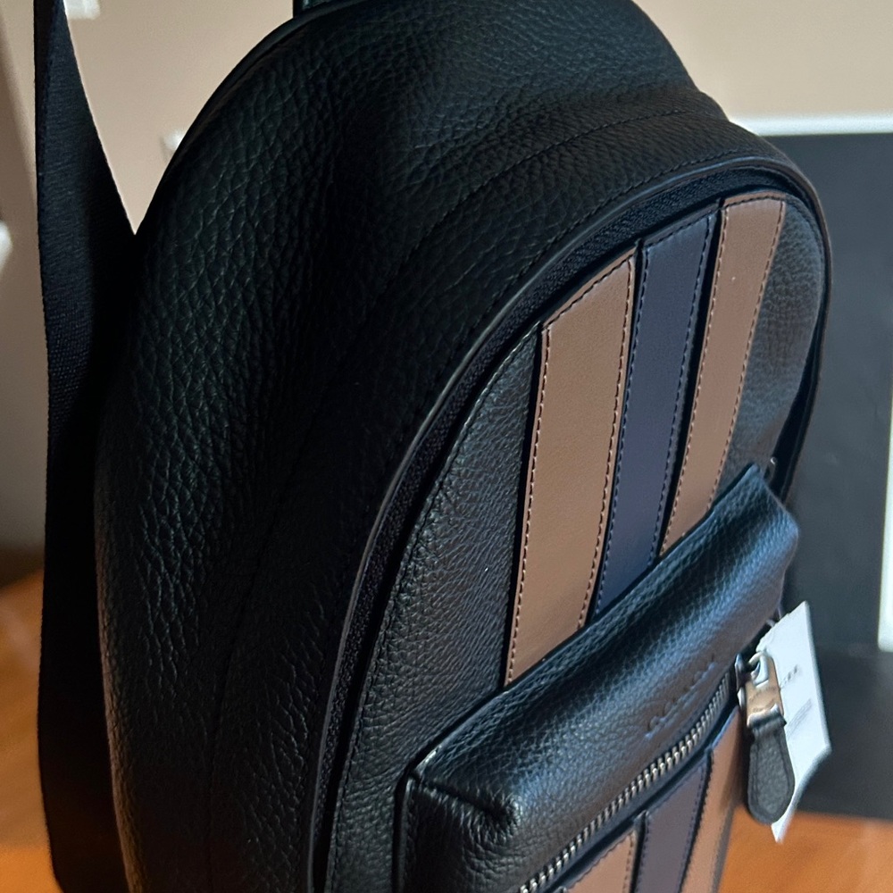 Coach Messenger Bag.